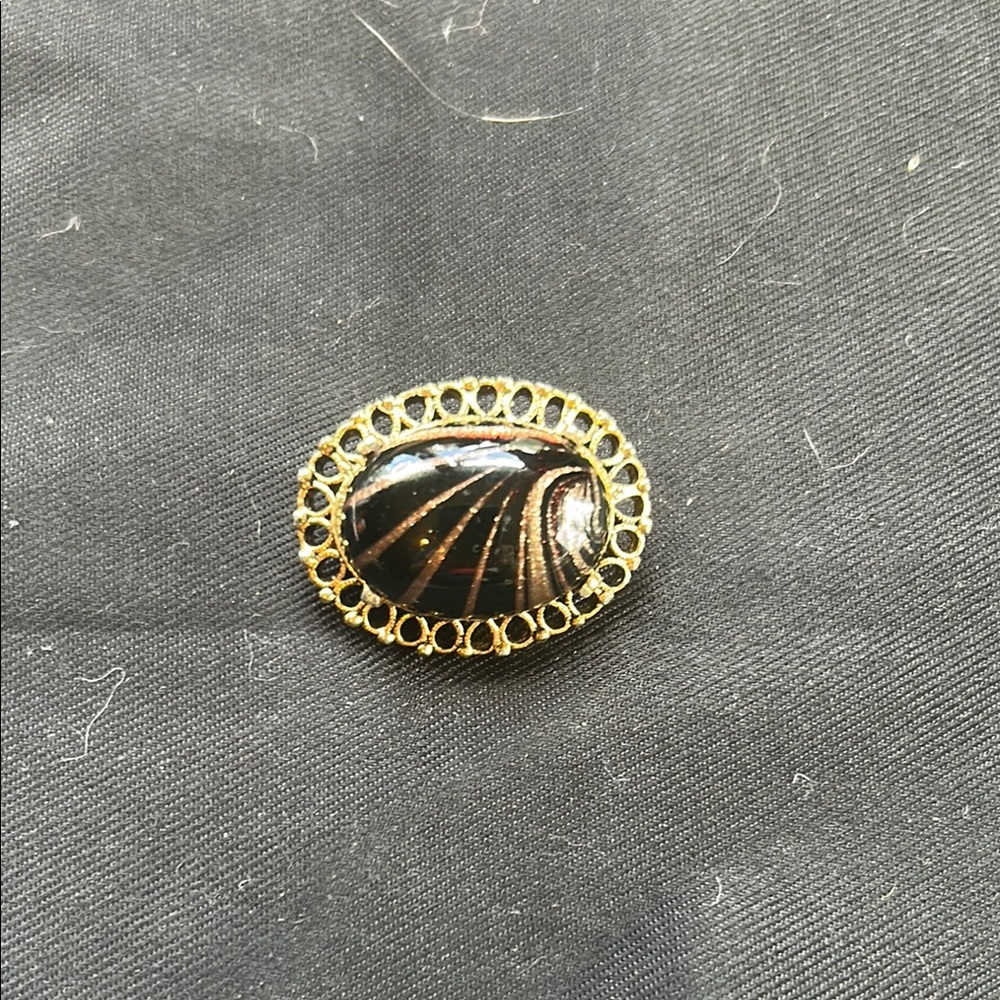 Sophisticated Gold and Black Brooch